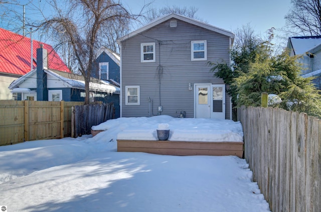 view of snow covered property