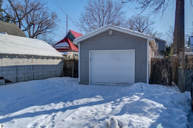 view of snow covered garage