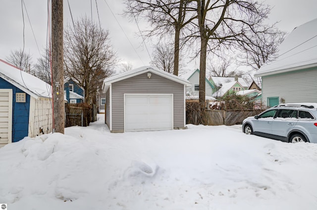 exterior space with an outbuilding and a garage