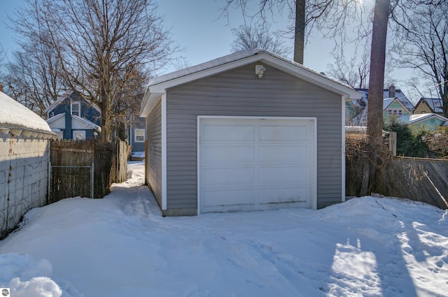 view of snow covered garage