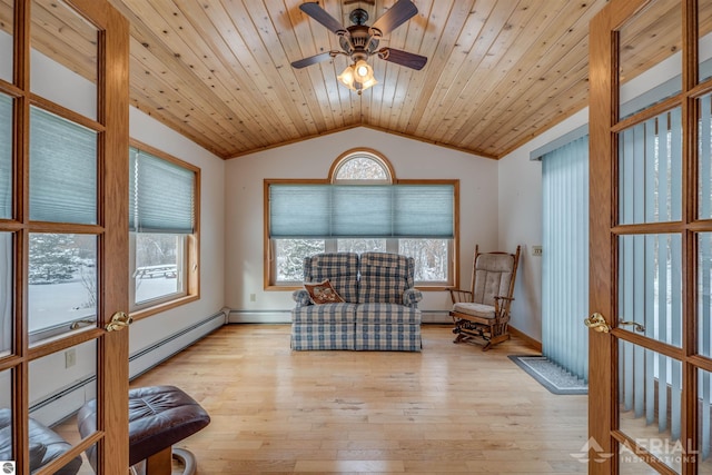 living area with wood ceiling, vaulted ceiling, ceiling fan, and light wood-type flooring