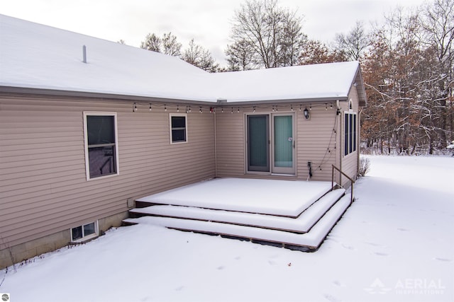 view of snow covered property