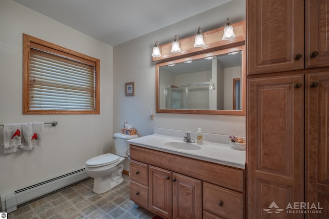 bathroom with a baseboard radiator, vanity, toilet, and a shower with door