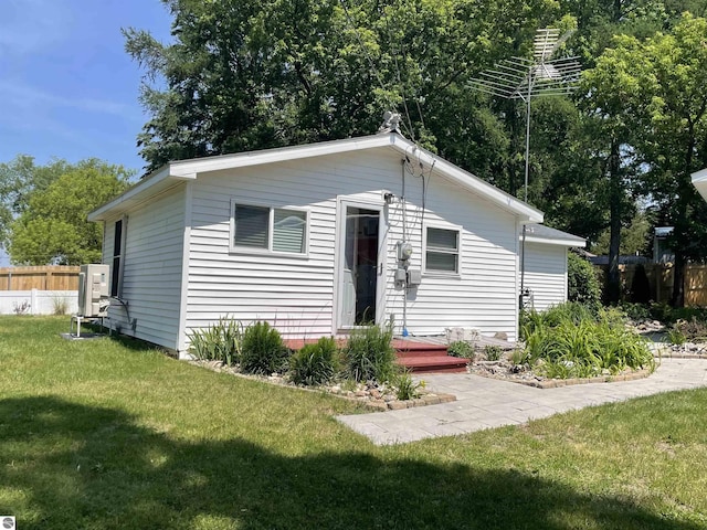 view of front of home with a front yard