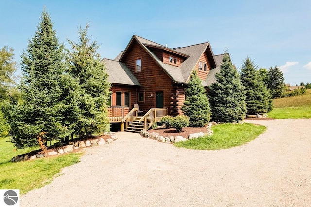 cabin featuring a wooden deck