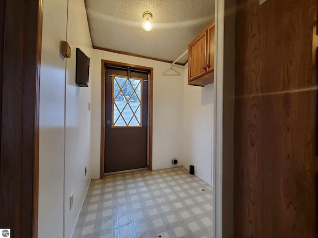 washroom featuring a textured ceiling