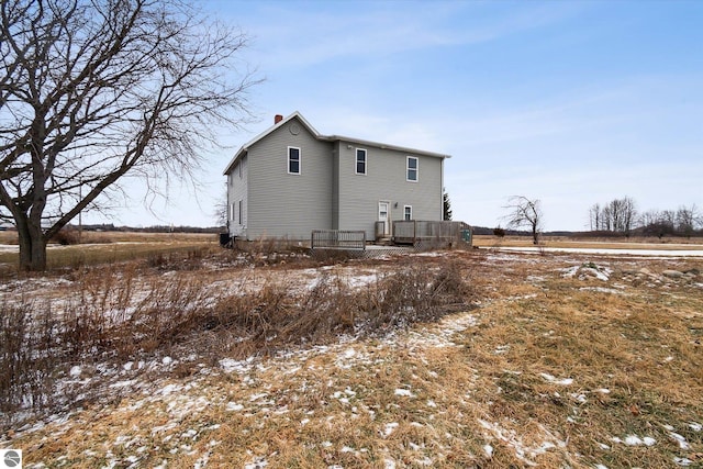 view of snow covered house