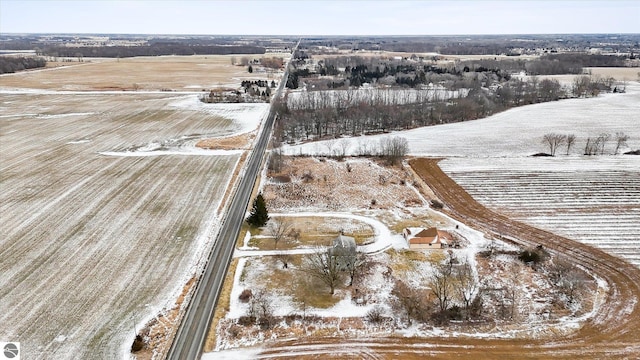 snowy aerial view with a rural view