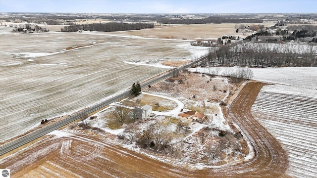 snowy aerial view with a rural view