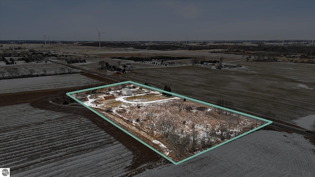 birds eye view of property featuring a rural view