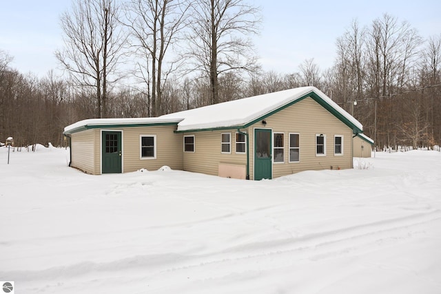 view of snow covered property