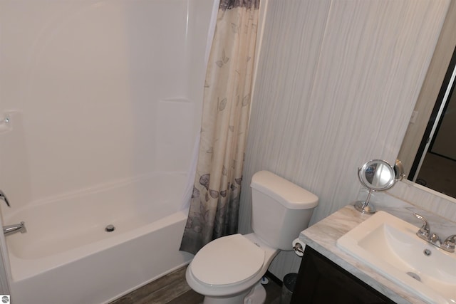 full bathroom featuring shower / tub combo with curtain, vanity, toilet, and wood-type flooring