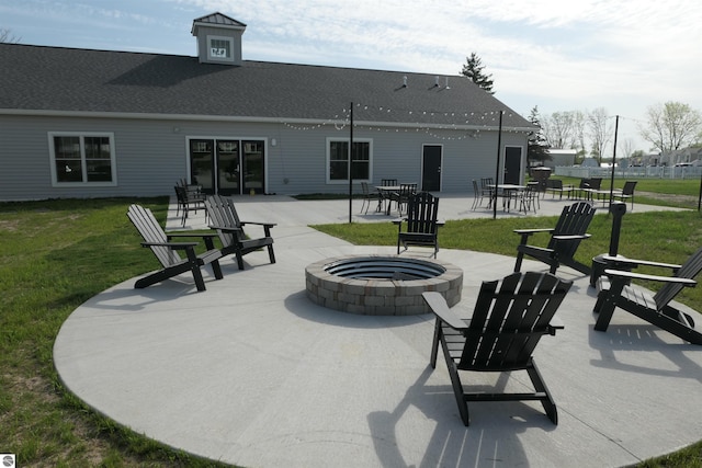 view of patio with an outdoor fire pit