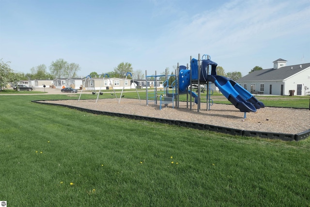 view of playground featuring a lawn