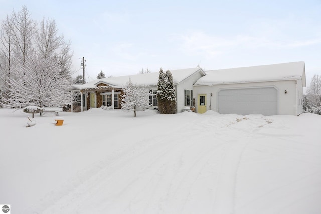 view of front of home with a garage