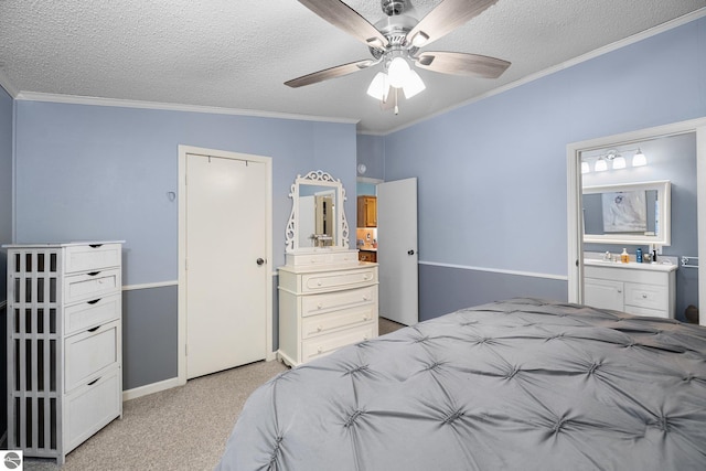 bedroom featuring crown molding, light colored carpet, and a textured ceiling