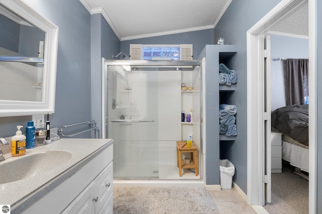 bathroom with walk in shower, ornamental molding, a textured ceiling, and vanity