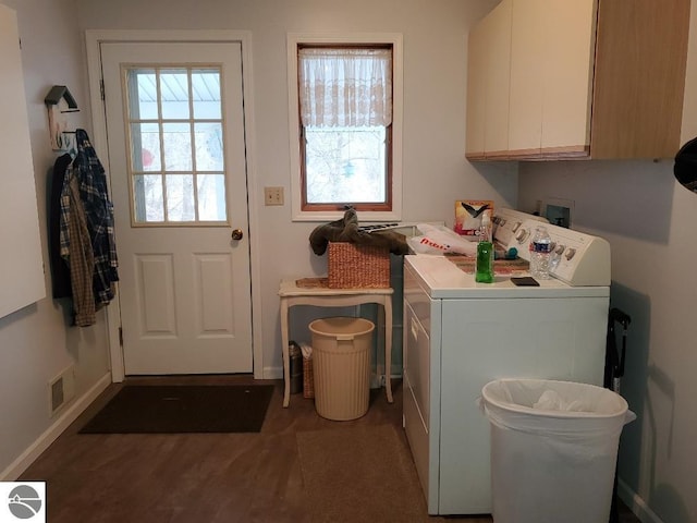 laundry area with cabinet space, visible vents, baseboards, dark wood-style floors, and washer hookup