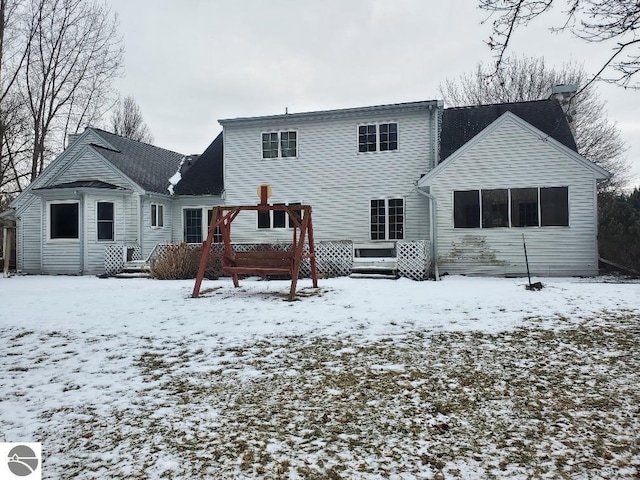 view of snow covered property