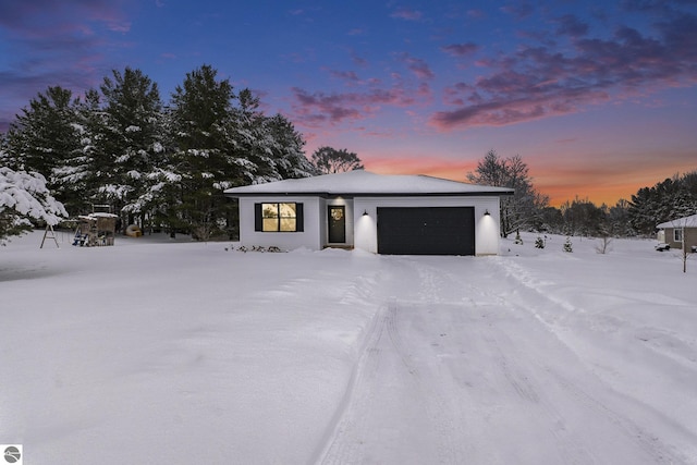 view of front of property featuring a garage