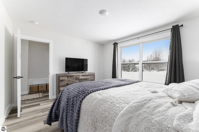 bedroom featuring light wood-type flooring