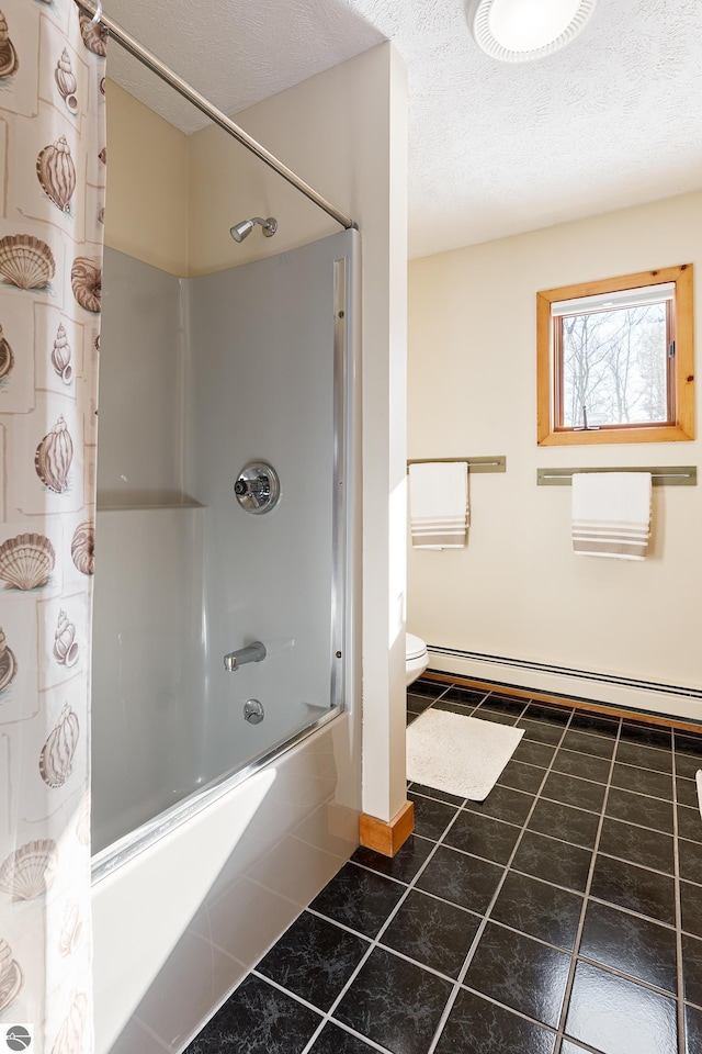 bathroom featuring tile patterned flooring, a baseboard heating unit, shower / bath combo, and a textured ceiling