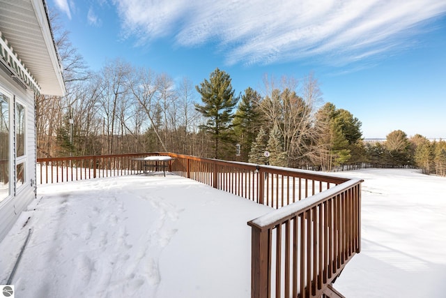 view of snow covered deck