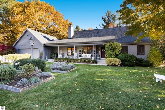 ranch-style home featuring a front lawn, a porch, a chimney, an attached garage, and a vegetable garden