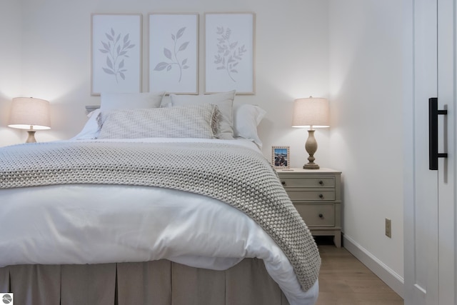 bedroom featuring light hardwood / wood-style flooring