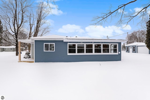 view of snow covered property