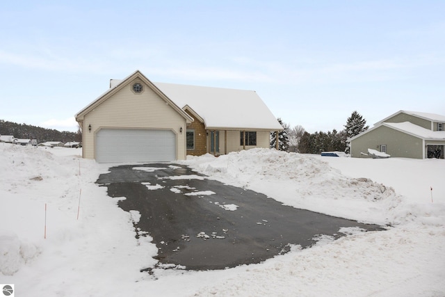 view of front of property featuring a garage