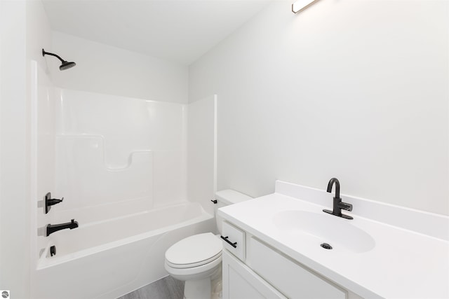 full bathroom featuring shower / bathtub combination, vanity, and toilet