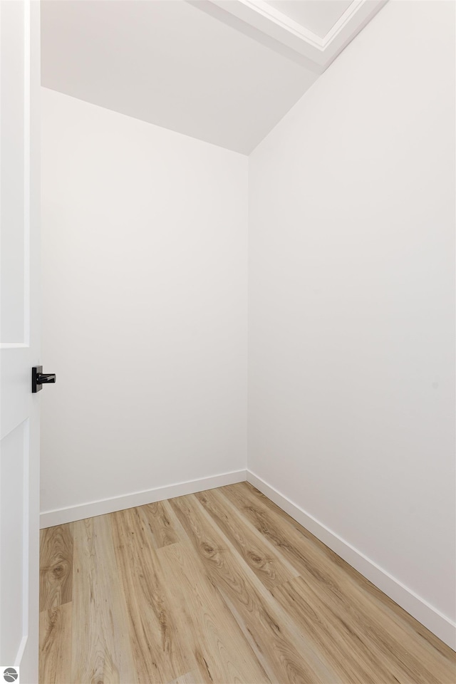 spare room featuring light hardwood / wood-style flooring