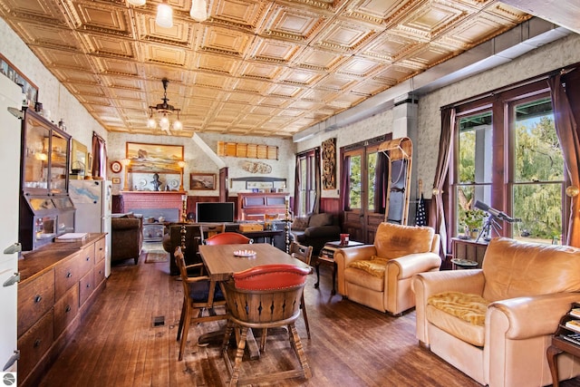 office with french doors and dark hardwood / wood-style floors