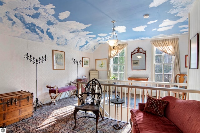 living room featuring vaulted ceiling