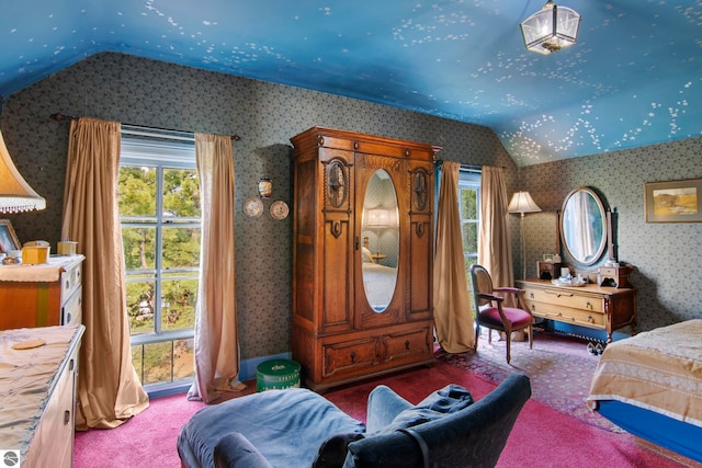 carpeted bedroom with vaulted ceiling