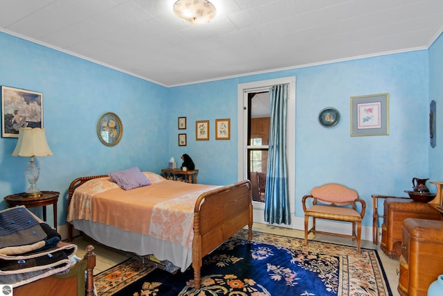 bedroom with ornamental molding