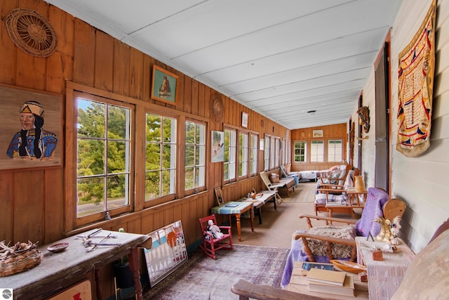 sunroom with lofted ceiling