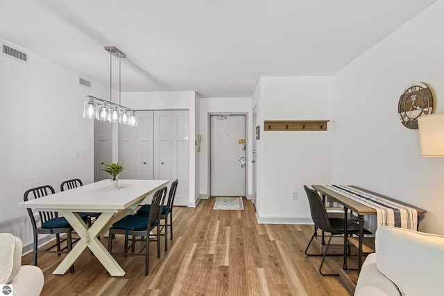 dining area featuring light hardwood / wood-style flooring