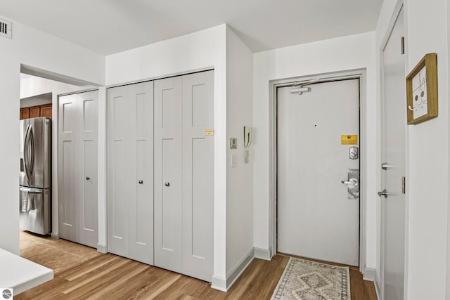 foyer featuring light hardwood / wood-style floors