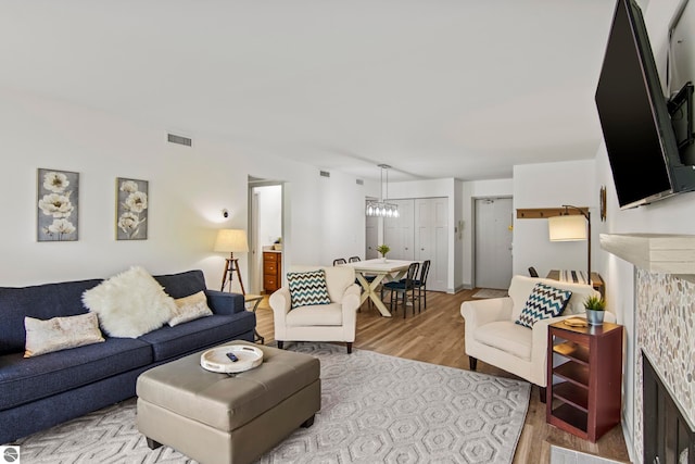 living room with light hardwood / wood-style flooring