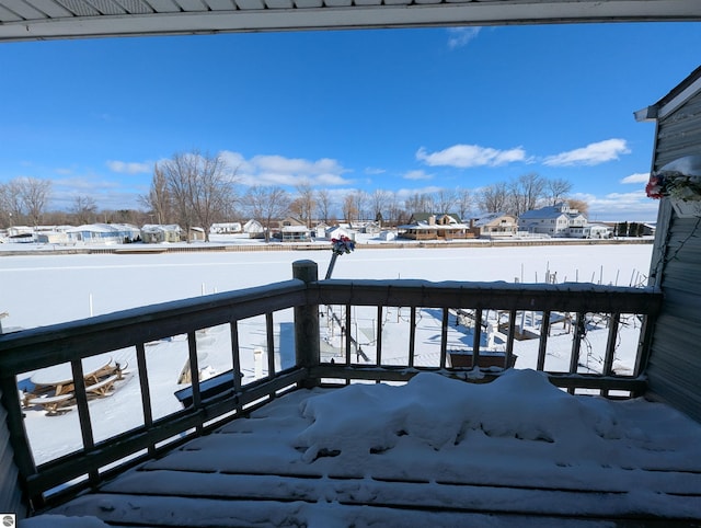 view of snow covered deck