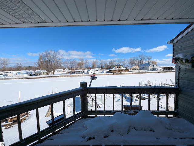 view of snow covered deck