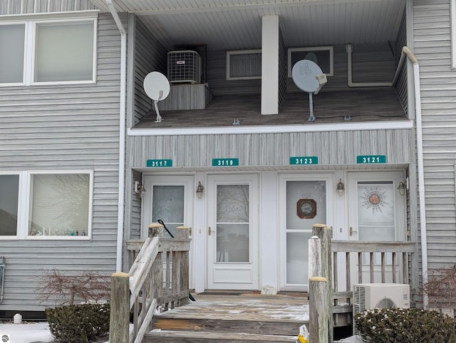 entrance to property featuring ac unit