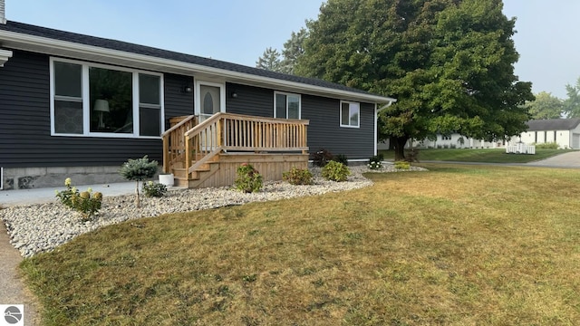 ranch-style house with a front yard