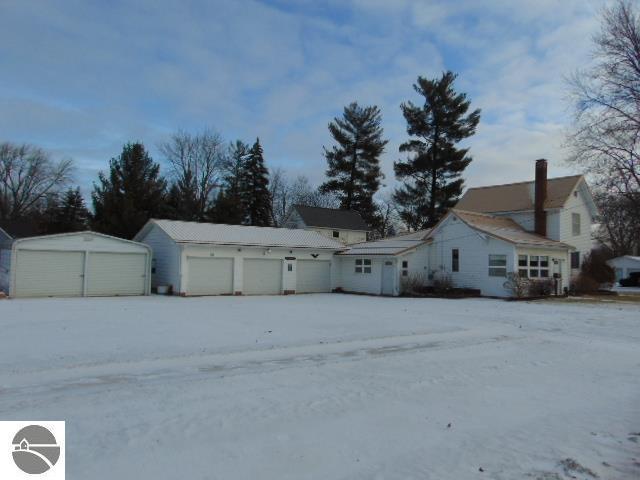 exterior space featuring a detached garage