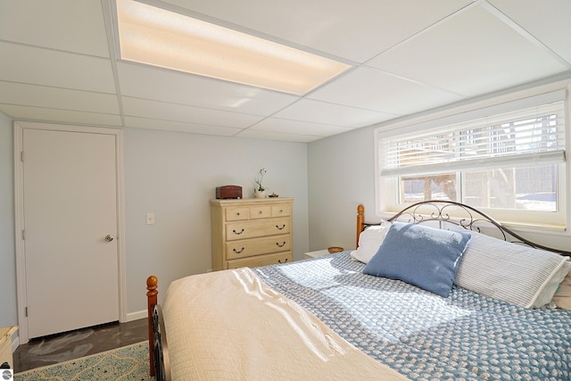 bedroom featuring a drop ceiling