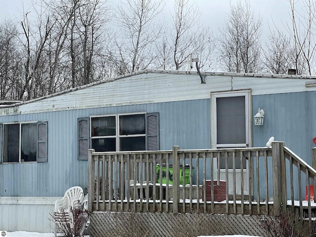 view of home's exterior with a deck