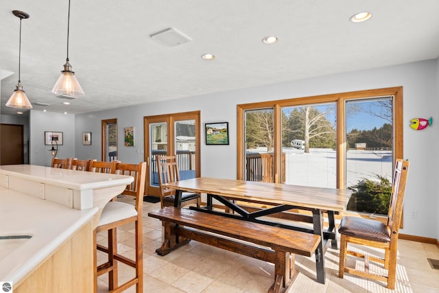 dining area featuring french doors