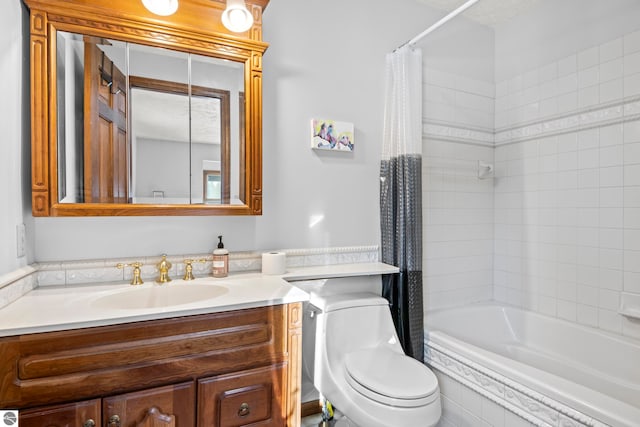 full bathroom featuring vanity, toilet, and shower / bath combo